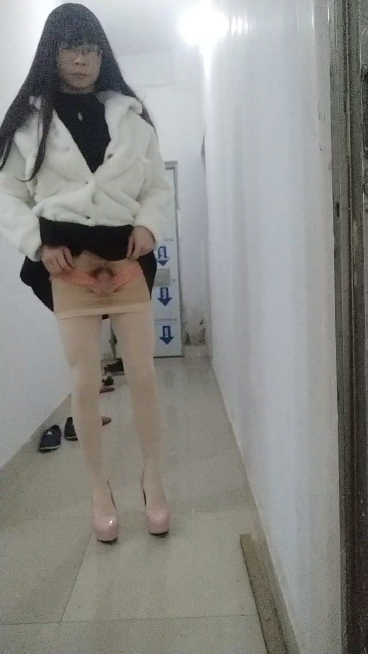 Corridor self masturbation
