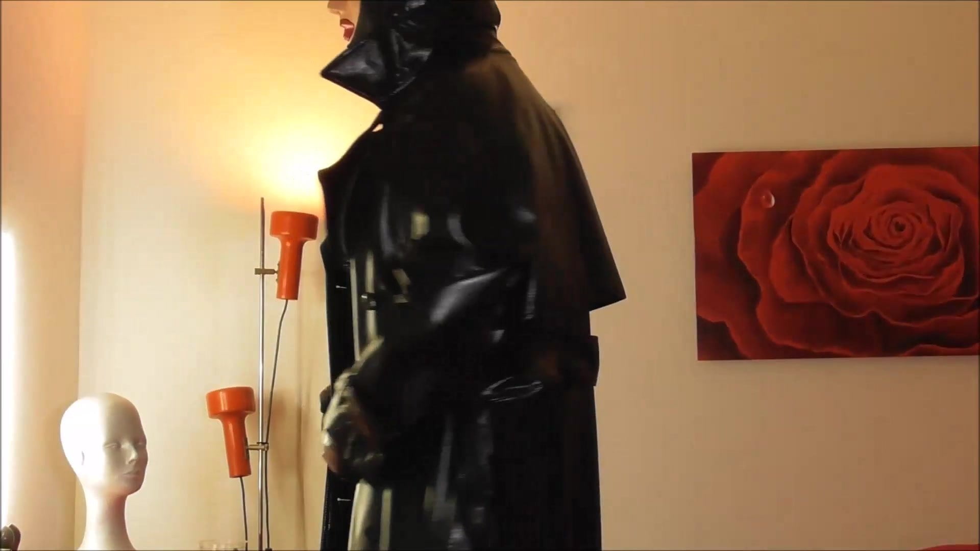 Rubber Mistress M wanks on Floor